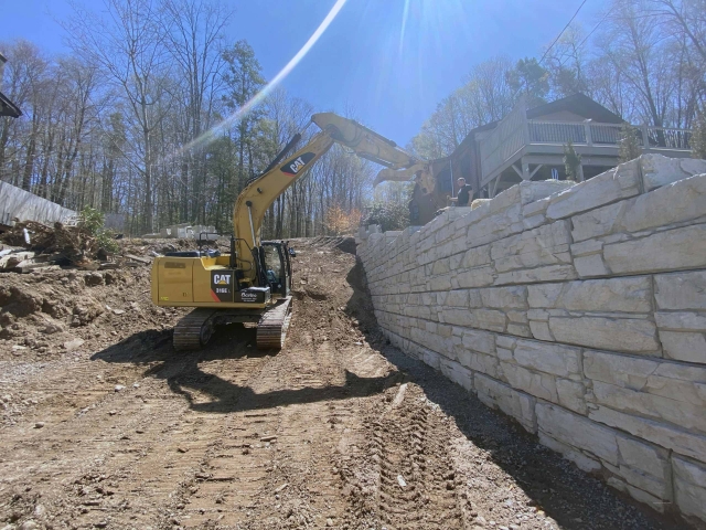 Building taller gravity retaining walls with MagnumStone gravity extenders