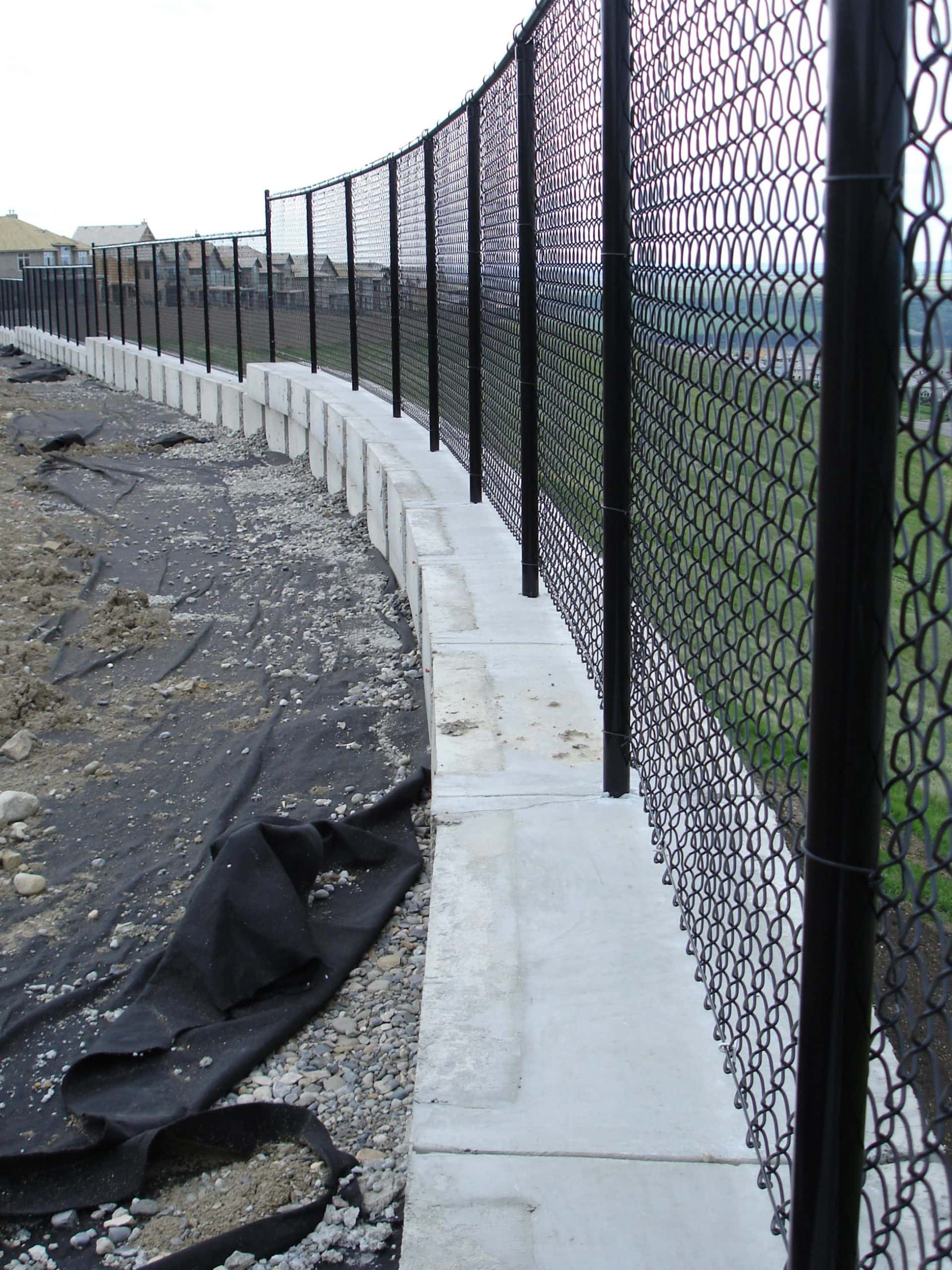 Fence Posts Installed Inside MagnumStone Block Hollow Cores
