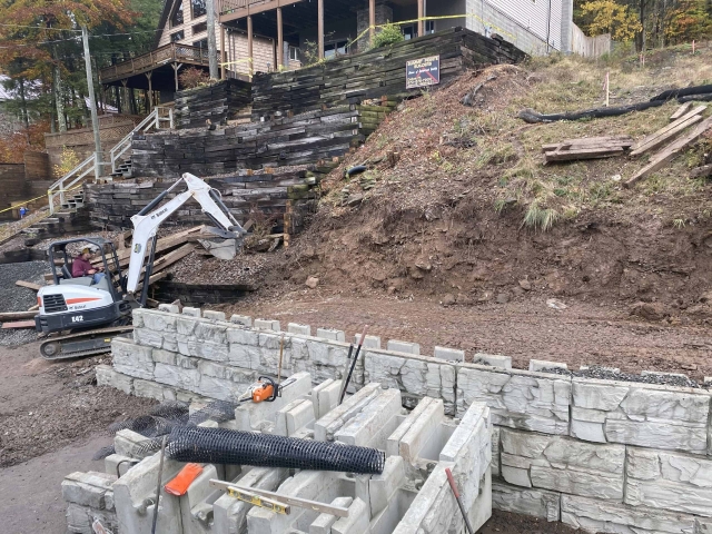 Installing a MagnumStone geogrid retaining wall