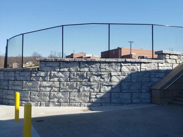 MagnumStone Curved Retaining Wall Supporting Parking Lot, West Virginia