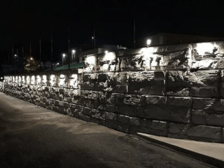 MagnumStone Retaining Wall Under Cap Lighting at Football Field