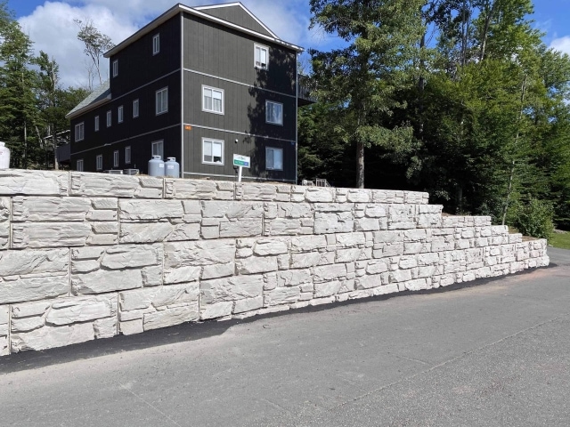 MagnumStone retaining walls are far less costly than gabion basket retaining wall systems