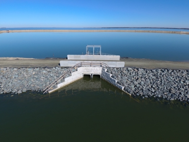 Water Passing Through Poplar Island Spillway and MagnumStone Retaining Wall