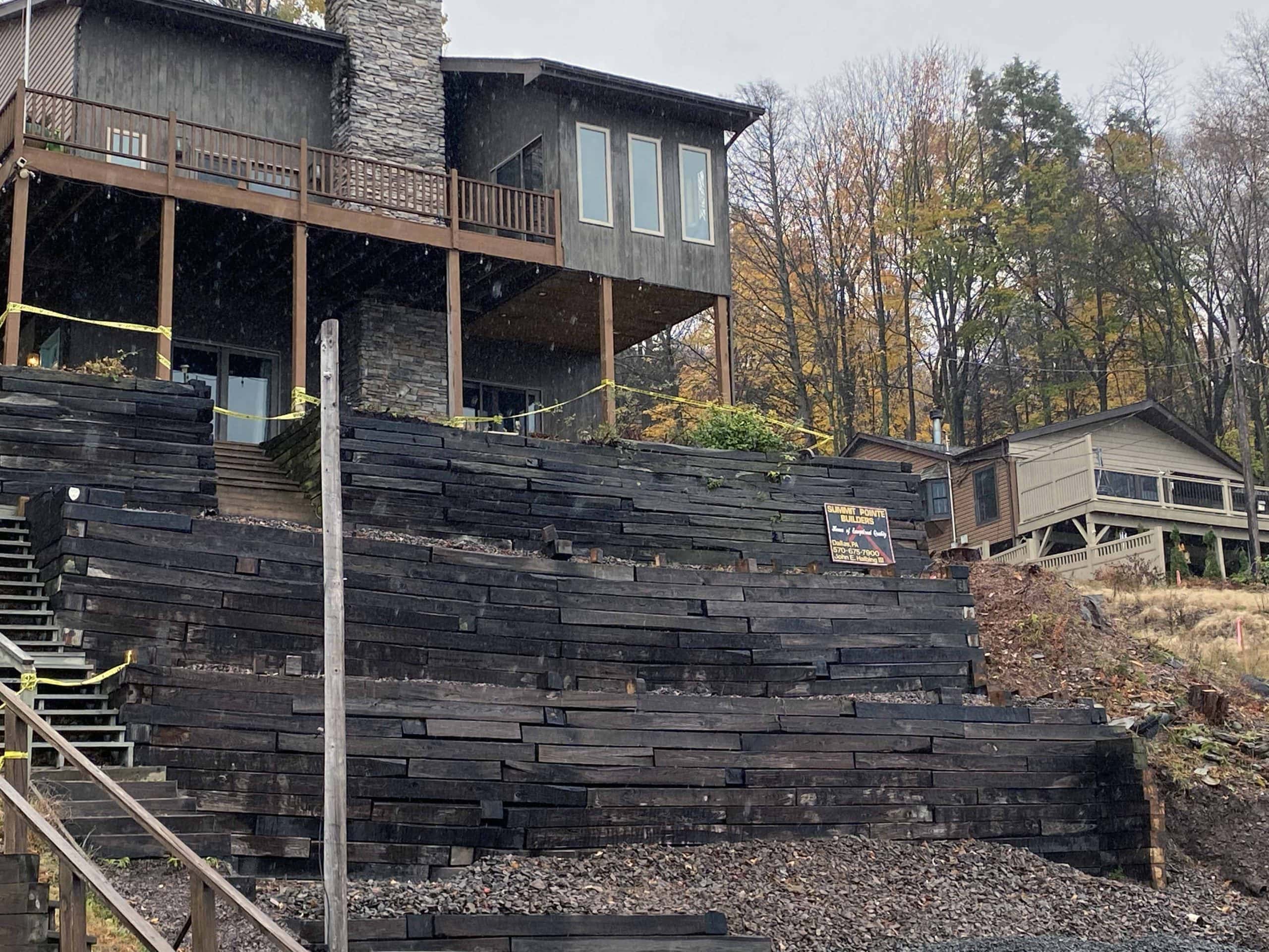 Wooden retaining walls replaced by MagnumStone blocks