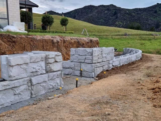 Installation of MagnumStone retaining wall outside corners