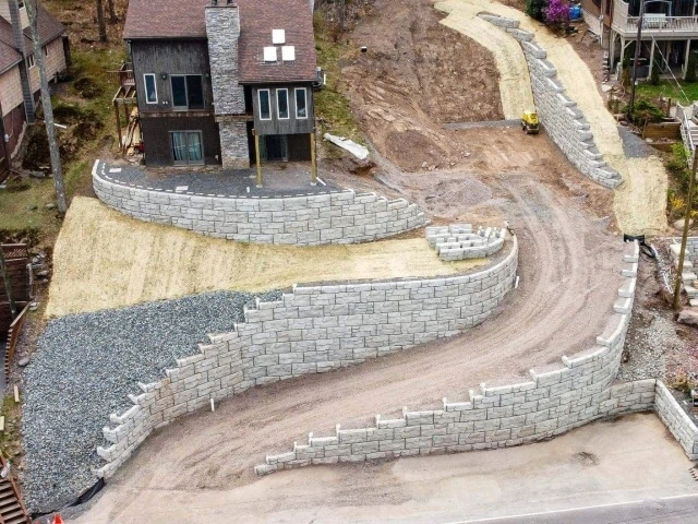 Aerial view of residential curved driveway retaining walls in Pennsylvania.