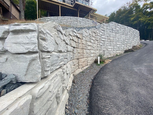 MagnumStone end cap blocks for curved driveway wall.