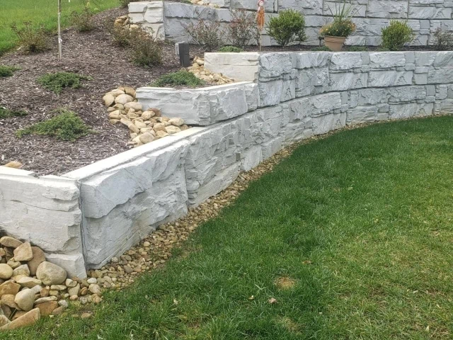 Plantable retaining wall with MagnumStone blocks.