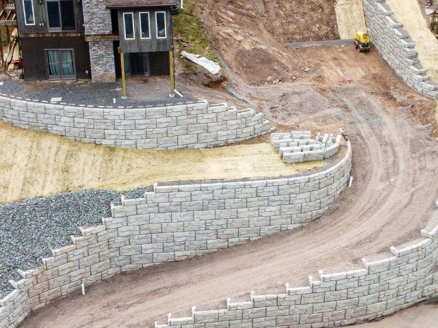 Step-down retaining wall residential property.