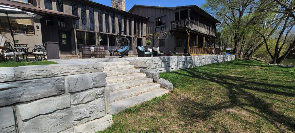 MagnumStone retaining wall blocks protect riverside property.