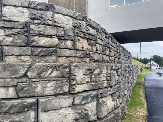 Tiered MagnumStone wall solution for school extension.