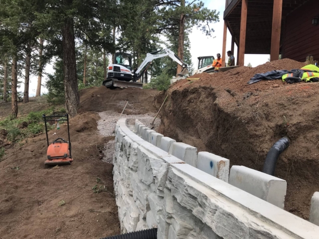 Base Course Installation of MagnumStone retaining wall.