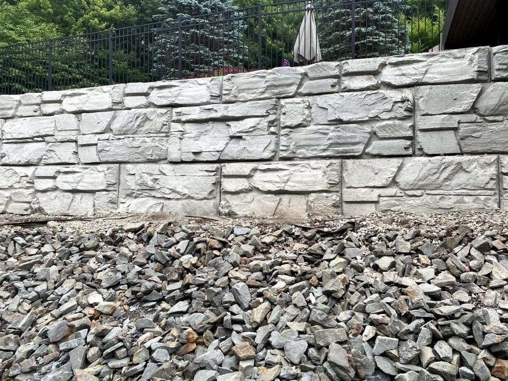Finished MagnumStone retaining wall for residential property.