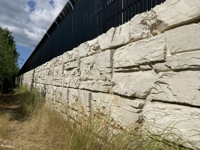 Complete MagnumStone block wall with fence.