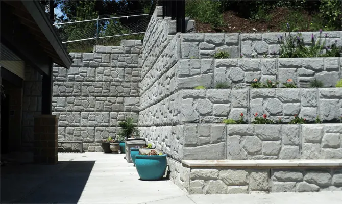 Terraced MagnumStone gravity retaining wall.