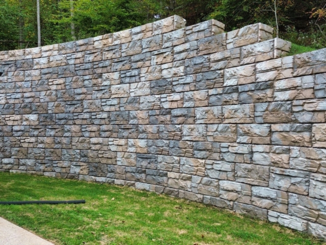 Yard extension with MagnumStone retaining wall.