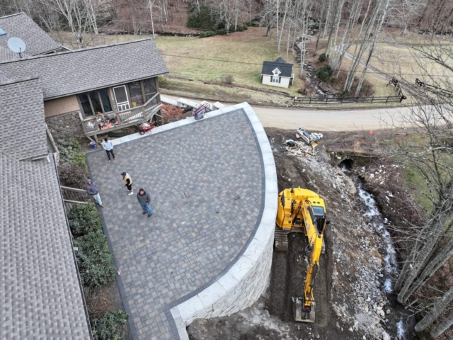 Completion of MagnumStone retaining wall and new patio.