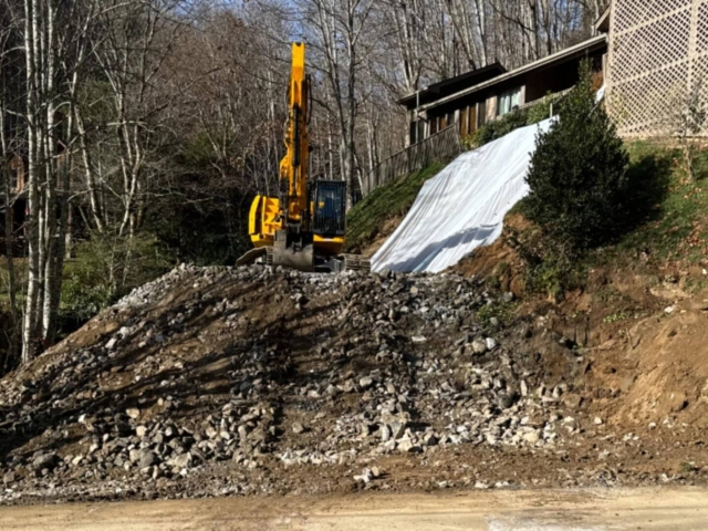 Emergency repairs to stabilize steep slope with MagnumStone.