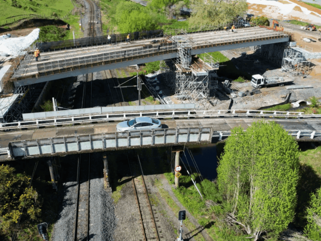 Old bridge and new bridge construction Kopaki, NZ.