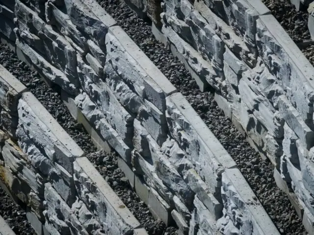 Steep tiered slope stabilization MagnumStone blocks.