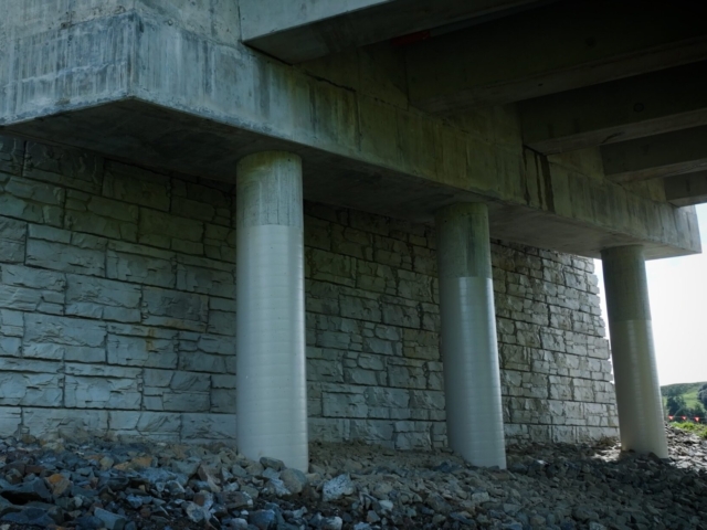 Tall MagnumStone bridge abutments.