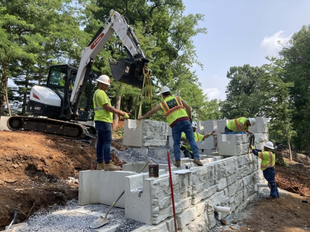 Installation of MagnumStone precast block.