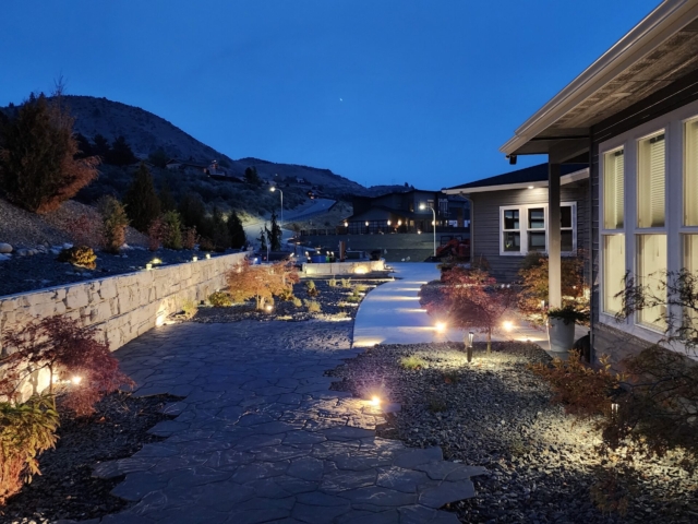 Lit landscape design with MagnumStone walls. Lit landscape design with MagnumStone walls.