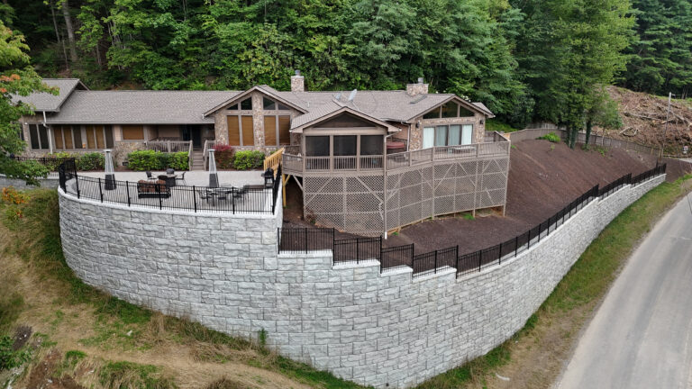 MagnumStone retaining wall rescues home from landslide.